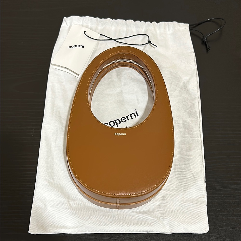 Coperni mini swipe leather top handle bag in camel brown